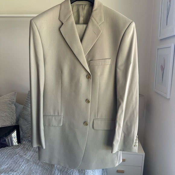 Calvin Klein men’s suit jacket is a 44R and pants are a 34/30